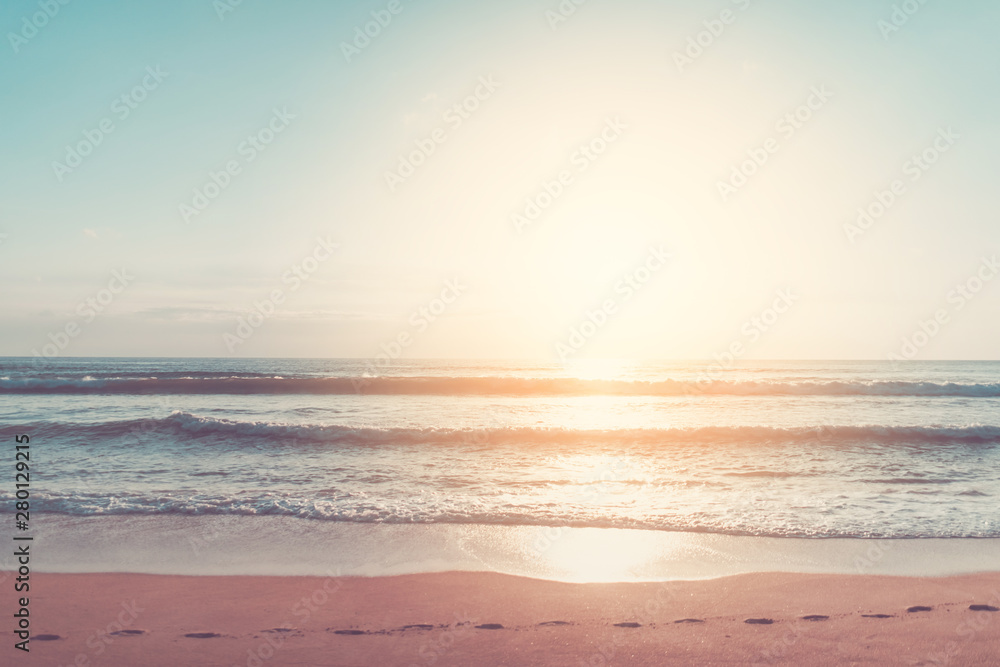 Fototapeta premium Copy space of soft sand sea and tropical beach with sunset sky and cloud abstract background.