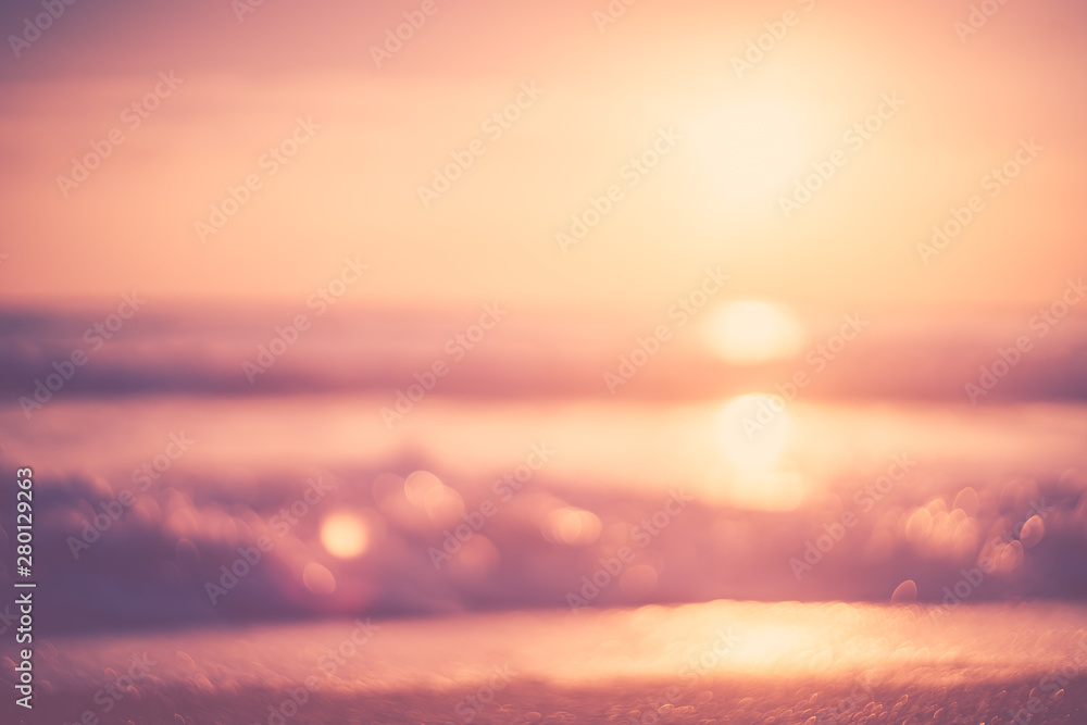 Copy space of soft sand sea and blur tropical beach with sunset sky and cloud abstract background.