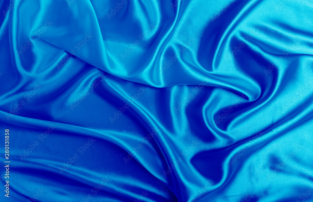 Blue satin fabric texture background Blue satin fabric texture background