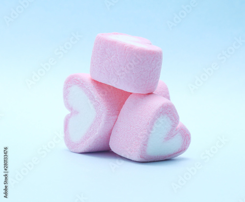colorful marshmallows candy on blue background