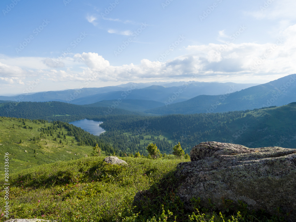 View from the top of the mountain to the Svetloye Lake in the Ergaki nature park. Siberian Mountains Western Sayan
