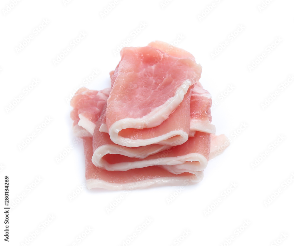 Raw pork meat with parsley herb leaves isolated on white background Raw pork meat with parsley herb leaves isolated on white background
