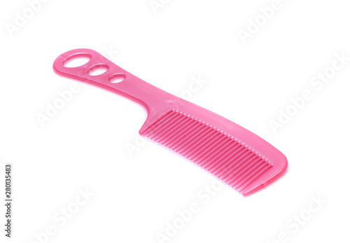 Pink comb isolated on white background