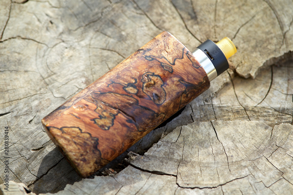high end natural stabilized wood box mods with rebuildable dripping atomizer, vaping device, selective focus