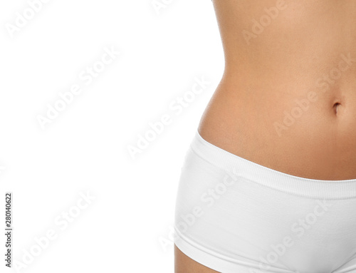 Young woman with slim body isolated on white, closeup. Plastic surgery concept