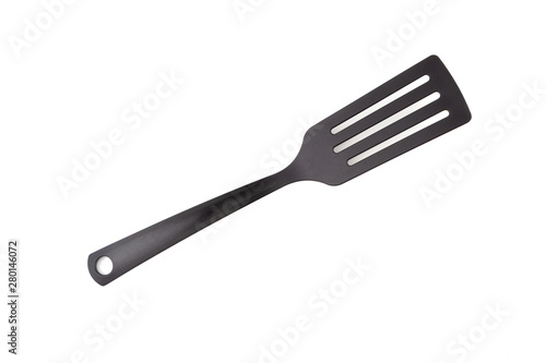 Black kitchen spatula utensils or kitchenware closeup isolated on white background