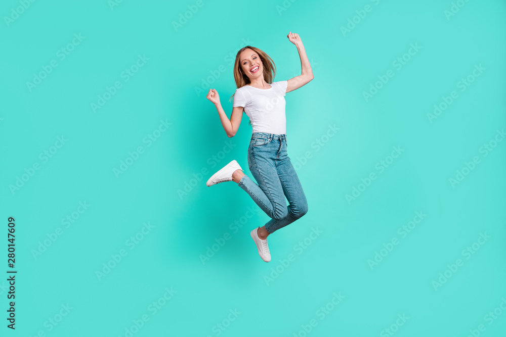 Full body photo of lovely cheerful person raising fists hands screaming shouting yeah isolated over teal turquoise background