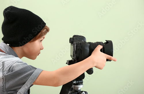 Cute little photographer wi...