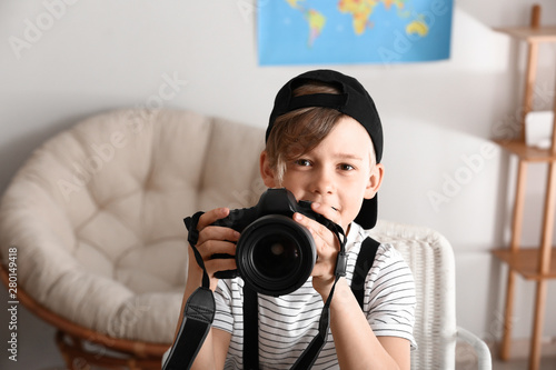 Cute little photographer wi...