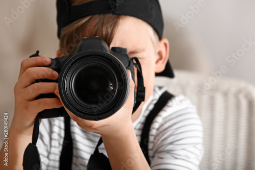 Cute little photographer wi...