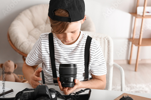 Cute little photographer wi...