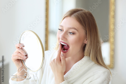 Woman checking whiteness of...