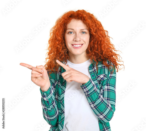 Beautiful redhead woman poi...