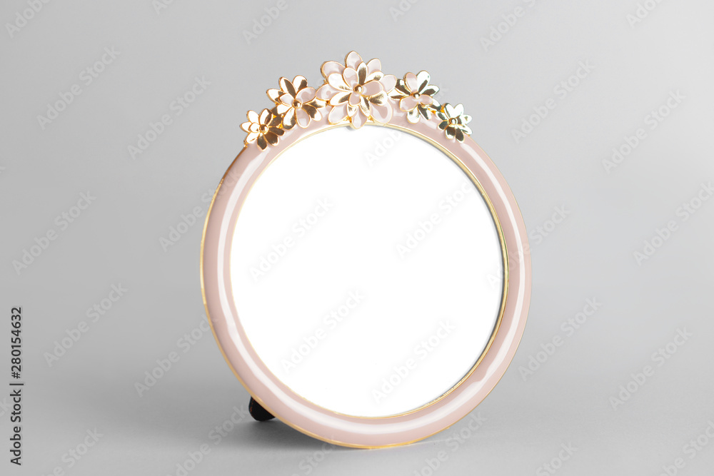 Empty photo frame on grey background Empty photo frame on grey background