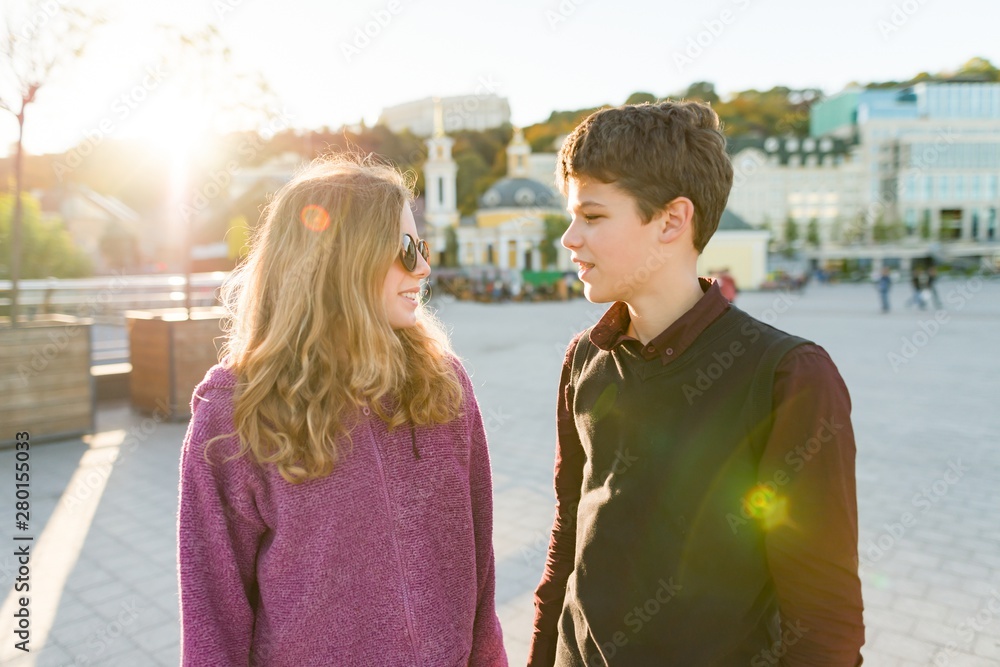 Naklejka premium Outdoor portrait of couple young boy and girl