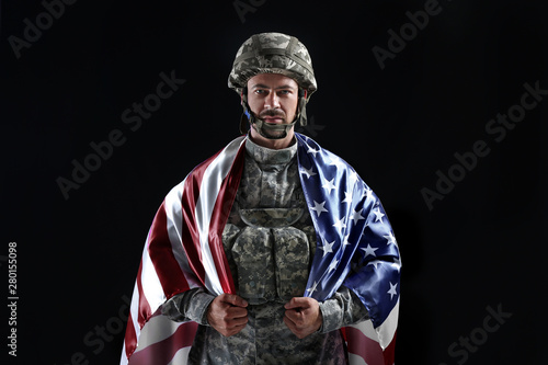 Soldier with national flag ...