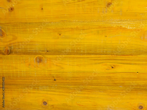 Old yellow door textured detail background 