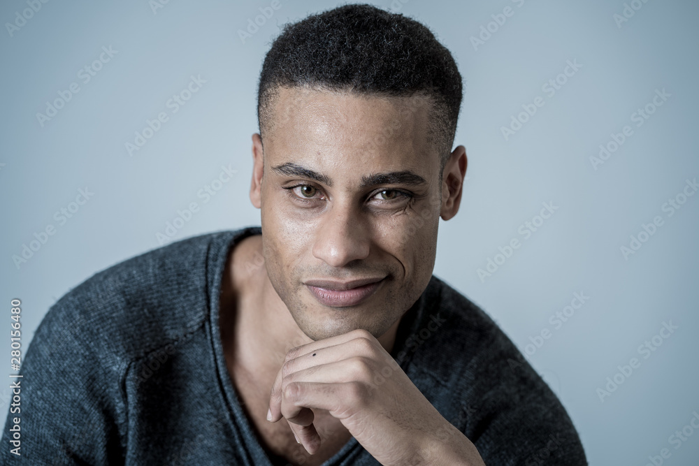 Fototapeta premium Fashion portrait of Attractive african american male model posing happy and sexy for the camera