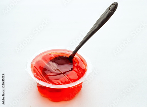 fruit jelly red with a spoon