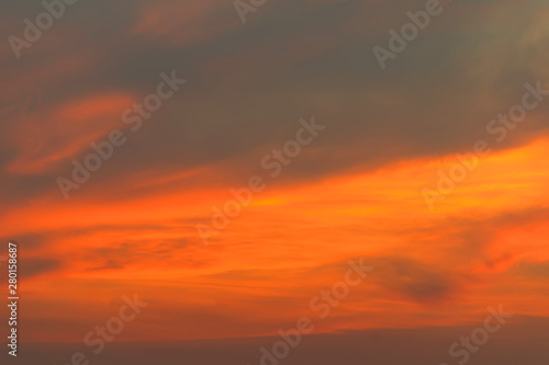 Orange and yellow sky.sky after sunset or sunrise background. © Chinnachote