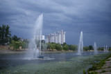 View of the Rusanovka canal, fountains working, buildings on a background and cloudy sky.  Kiev, Ukraine 