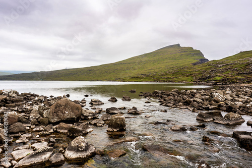 Narrow part of Leitisvatn lake before it flows into Bosdalafossur waterfall. Vagar, Faroe Islands, Denmark. photo