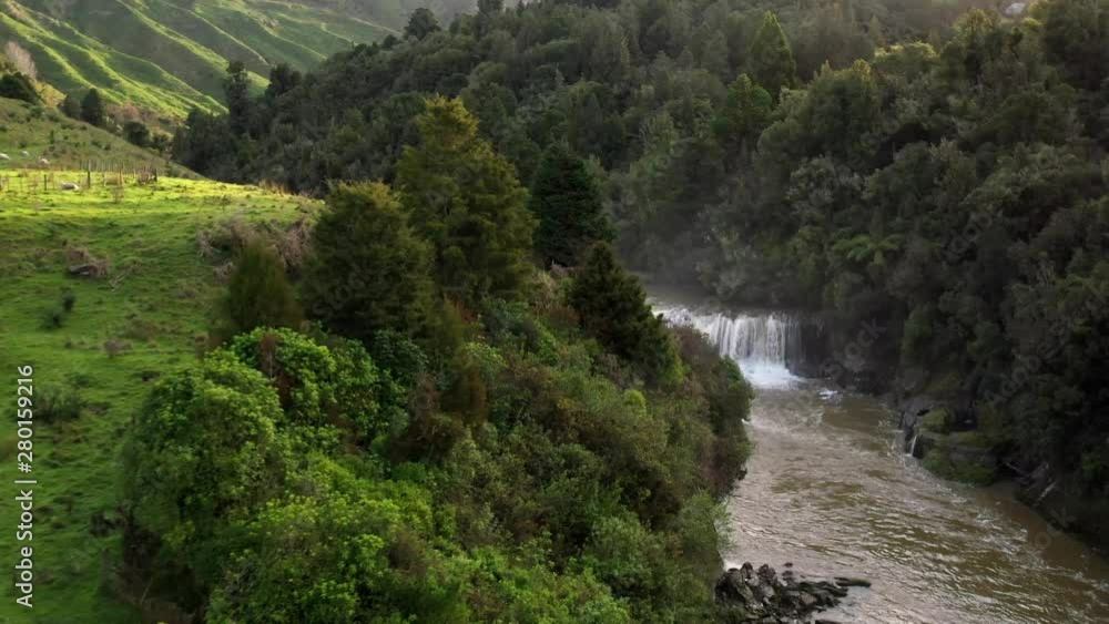 Arial view of a river waterfall, New Zealand, Reveal Drone shot Arial view of a river waterfall, New Zealand, Reveal Drone shot
