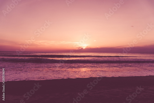 Tropical nature clean beach and white sand in summer with sun light blue sky and bokeh background.