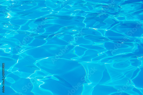 Clear transparent light blue water in the pool. Texture, water background in the pool_ © Volodymyr