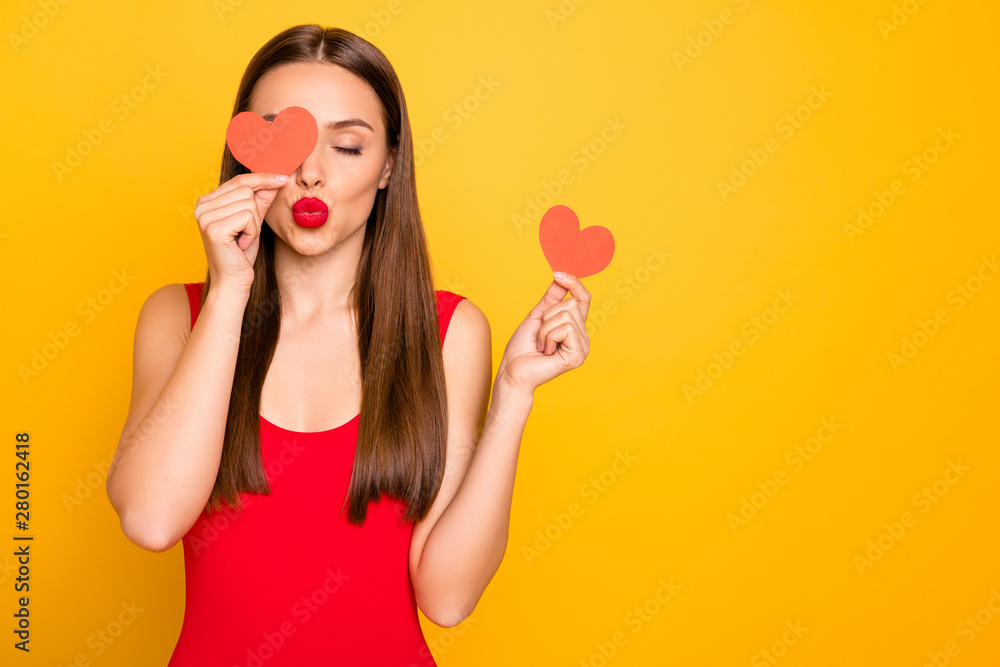 Photo of beautiful lady send air kiss hands little heart shape postcards hide eye romance date invitation wear red swim suit isolated yellow background Photo of beautiful lady send air kiss hands little heart shape postcards hide eye romance date invitation wear red swim suit isolated yellow background
