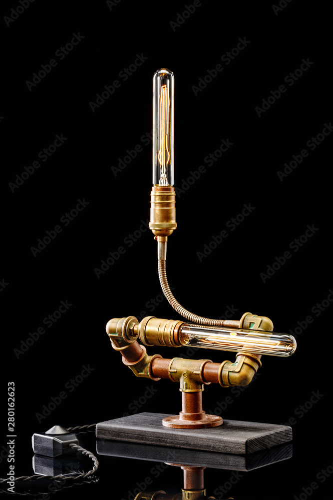 lamp in the style of steampunk isolated on a black background lamp in the style of steampunk isolated on a black background