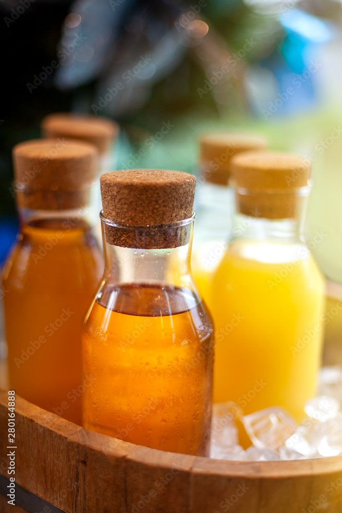 Natural orange juice in bottles Chilled, ready to drink Natural orange juice in bottles Chilled, ready to drink