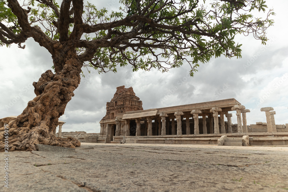 View through the Abandoned tree at Vittala Temple in Hampi, Karnataka, India