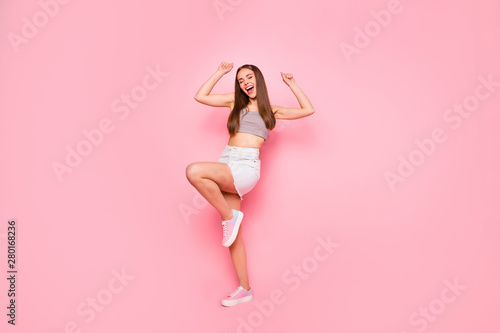 Full length body size view of her she nice-looking lovely feminine adorable overjoyed charming pretty cheerful cheery straight-haired lady having fun time isolated over pink pastel background