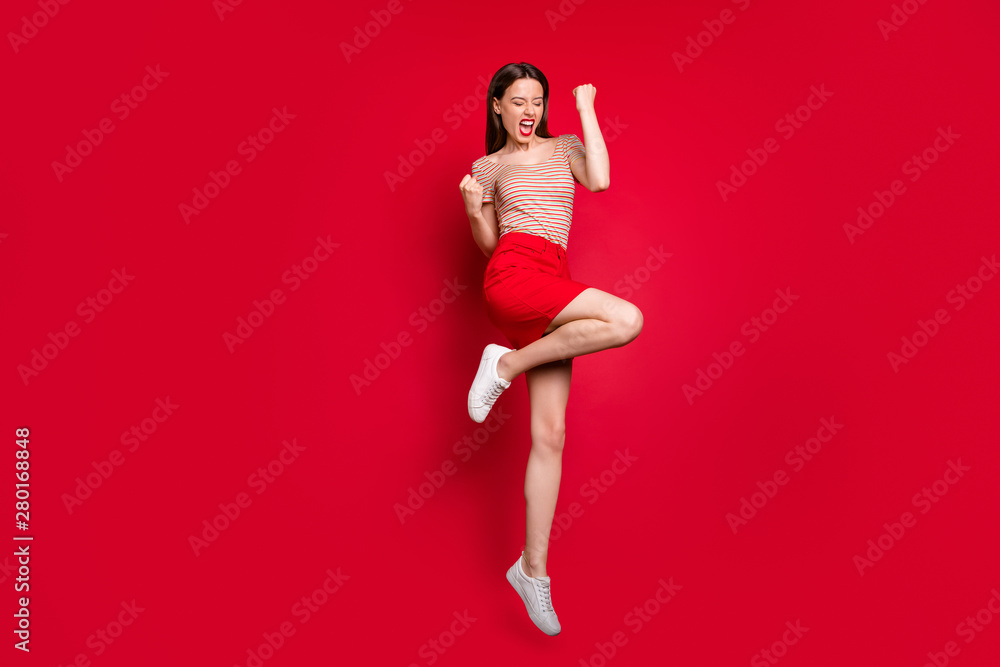 Full length size body photo of emotional mad ecstatic charming lady making gesture with fists jumping up isolated bright background - obrazy, fototapety, plakaty 