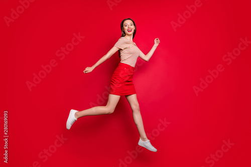 Full length body size photo of pretty cheerful excited lady hurrying up for sales on black friday isolated bright background