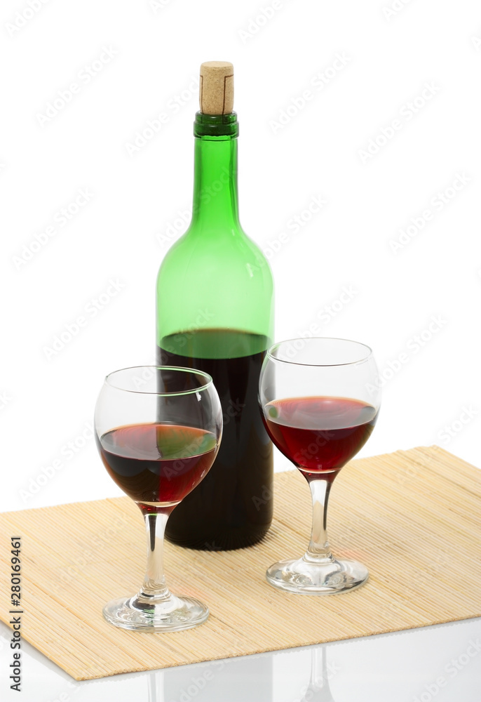 bottle and glass of red wine isolated with clipping path bottle and glass of red wine isolated with clipping path