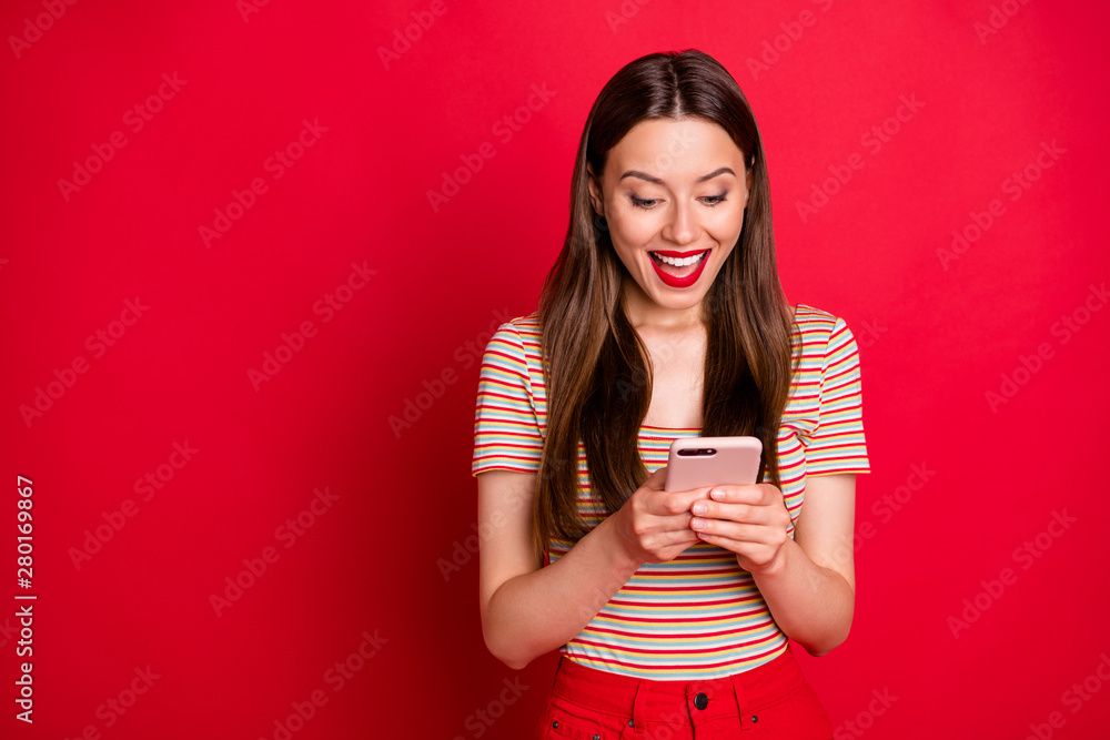 Photo of nice pretty cute charming lovely excited ecstatic funky funny lady holding smart device in hands isolated vivid background Photo of nice pretty cute charming lovely excited ecstatic funky funny lady holding smart device in hands isolated vivid background