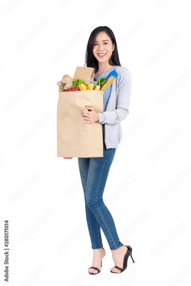 Beautiful Asian woman holding grocery shopping bag Beautiful Asian woman holding grocery shopping bag