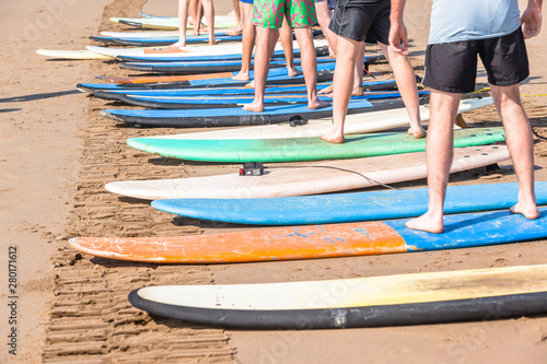 Surfing Lessons Student Legs Surfboards Beach Closeup Abstract photo