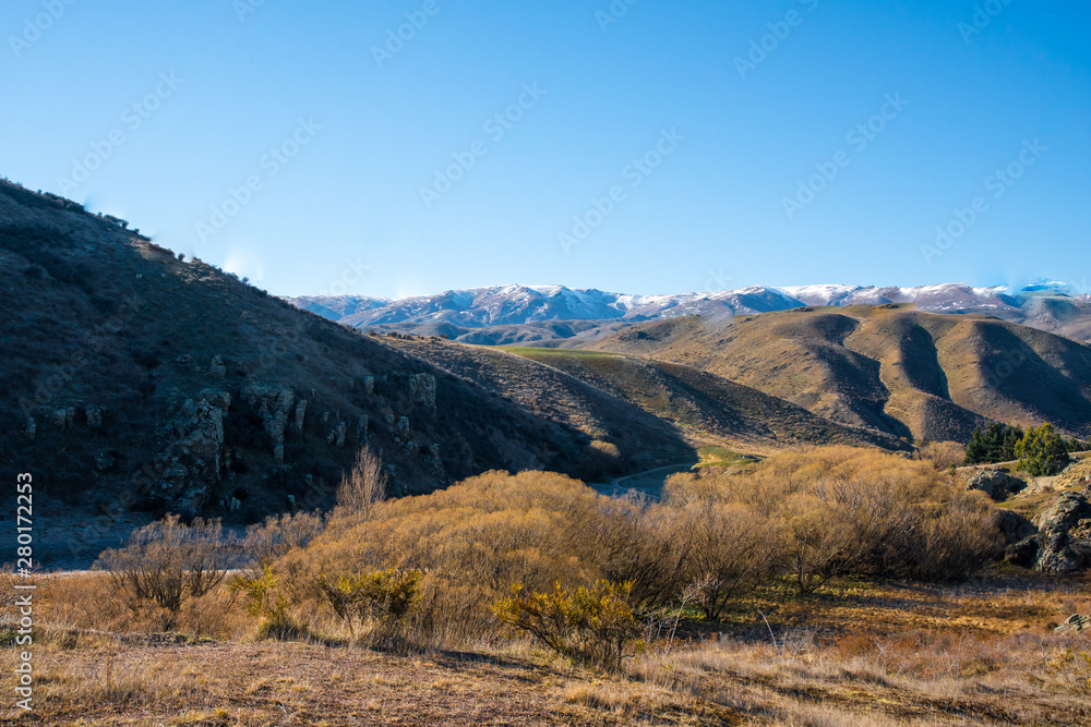 Agricultural farm land under the Southern Alps Agricultural farm land under the Southern Alps