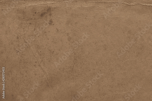 Vintage and old looking paper background. Retro cardboard texture. Grunge paper for drawing. Ancient book page.
