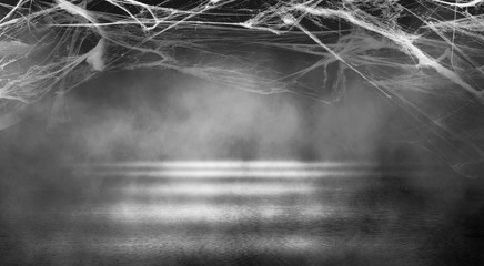 Background of empty space. Dark empty background, concrete, smoke, cobweb. Halloween background