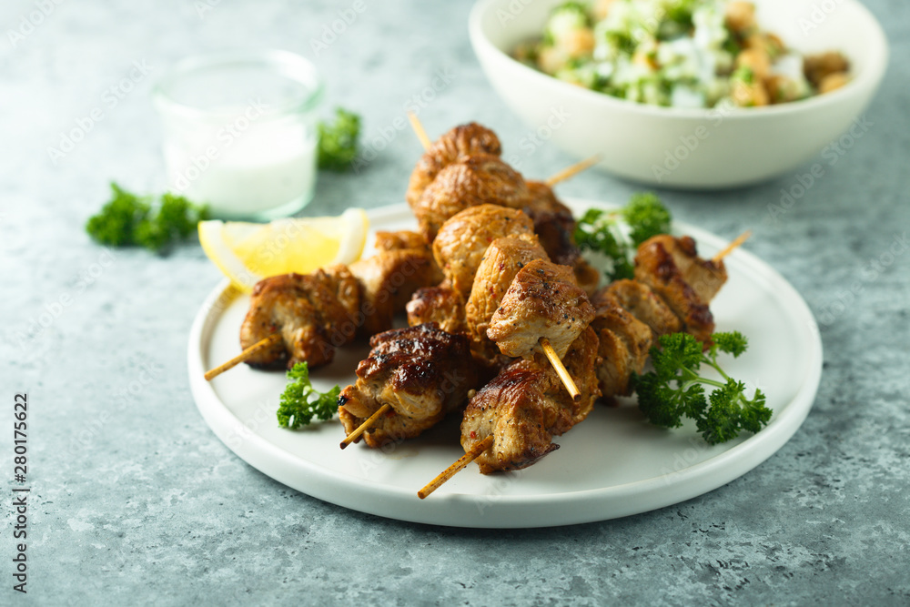Homemade chicken skewers with fresh parsley Homemade chicken skewers with fresh parsley