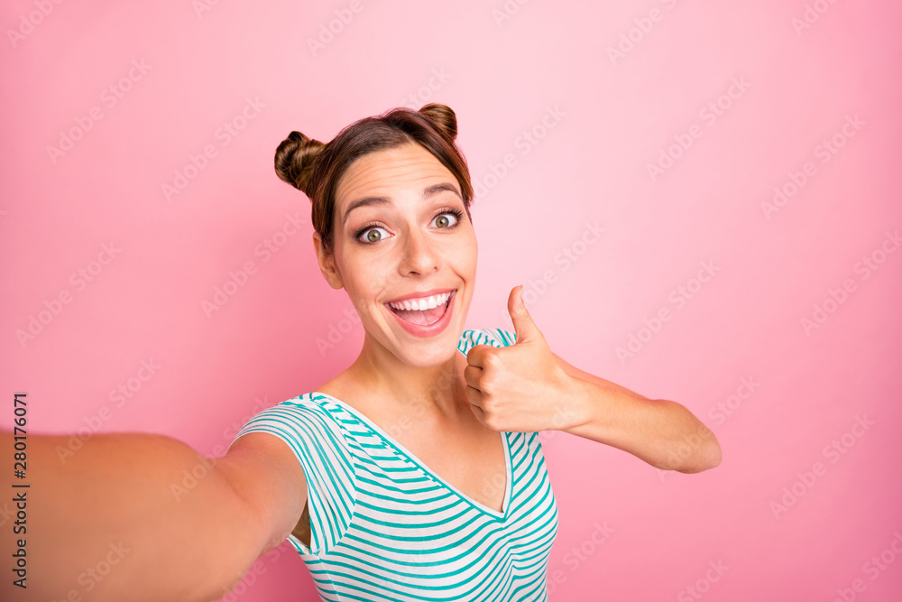 Self-portrait of her she nice-looking lovely lovable shine adorable charming cute cheerful cheery positive girl showing thumbup advert ad isolated over pink pastel background Self-portrait of her she nice-looking lovely lovable shine adorable charming cute cheerful cheery positive girl showing thumbup advert ad isolated over pink pastel background