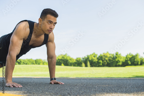 Athletic man practicing sport outdoor