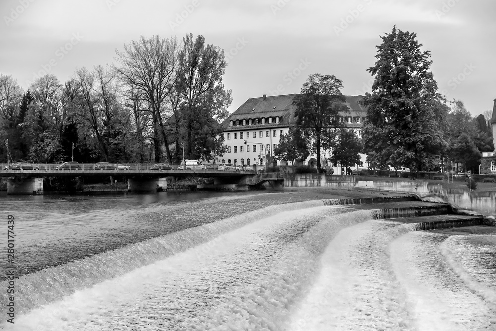 Small waterfall of the river Lech at the entrance of the old town of Landsberg am Lech, Germany Small waterfall of the river Lech at the entrance of the old town of Landsberg am Lech, Germany