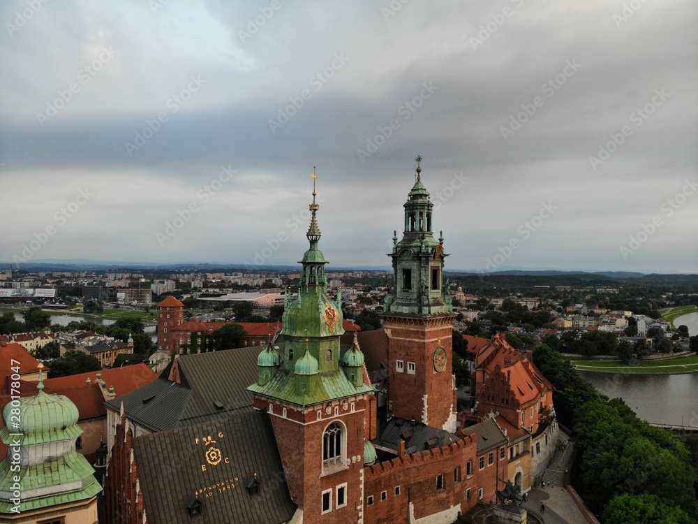 Fototapeta premium Aerial photo from drone. The culture and historical capital of Poland. Comfortable and beautiful Krakow. The land of Legend. The Wawel Castle.
