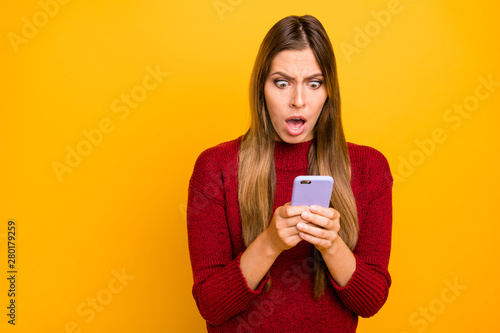 Photo of pretty lady holding telephone hands read bad news wear knitted pullover isolated yellow background