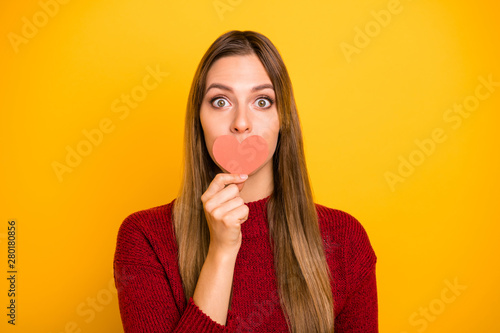 Pretty lady hide mouth with...